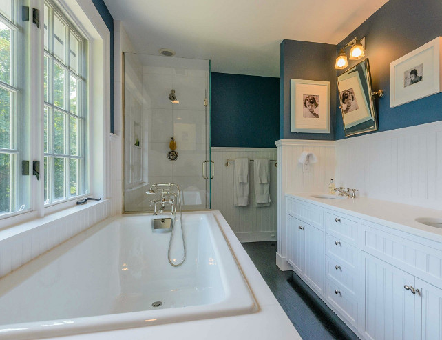Bathroom. Bathroom Ideas. Navy Blue bathroom with wainscotting and classic design details. #Bathroom