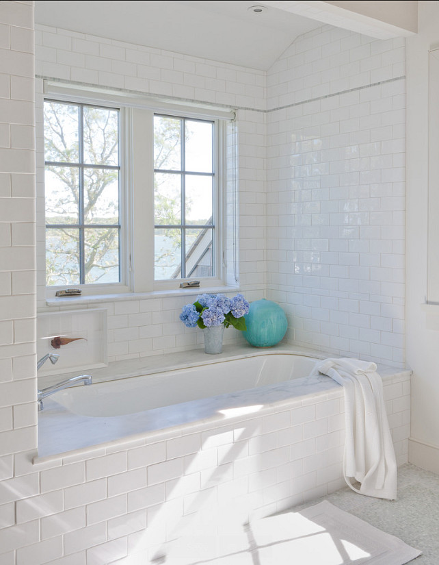 Bathroom. Bathroom Ideas. White Bathroom with subway tiles and marble flooring. #Bathroom