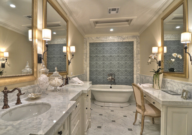Bathroom. Marble detailing on the walls, counter tops and floor give this master bathroom a clean and classic look. Relax in the pedestal bathtub or enjoy a shower large enough for two. #Bathroom