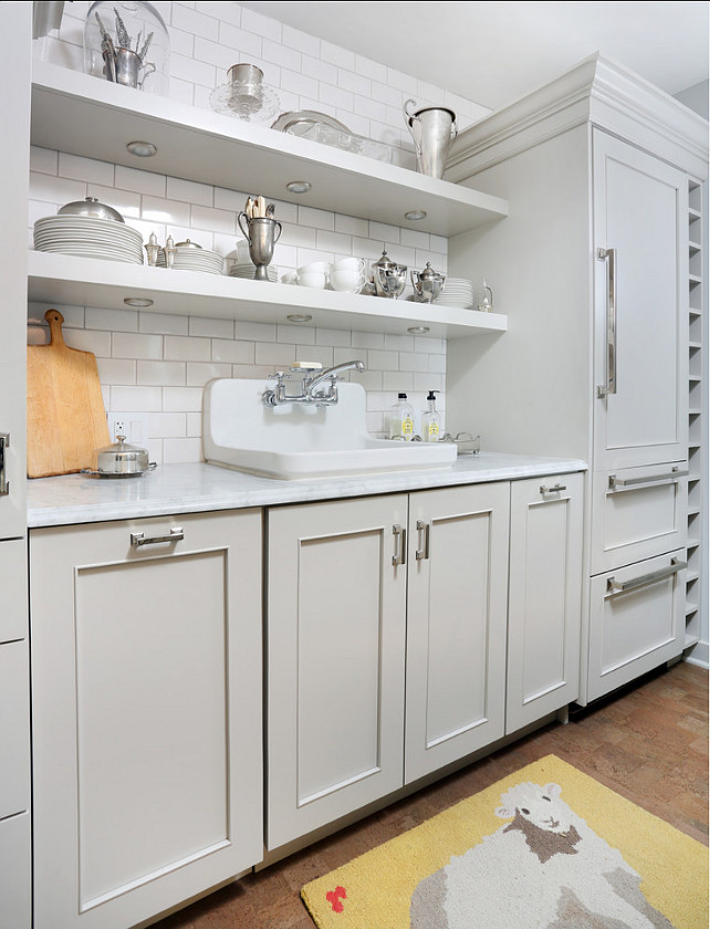 Gray Kitchen Ideas. Small Gray Kitchen with open shelves and white subway tile backsplash. #Kitchen #GrayKitchen #GrayCabinet #KitchenPaintColor Normandy Remodeling.