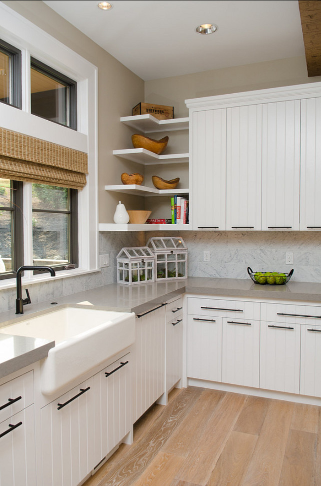 Kitchen Cabinet Ideas. The cabinets in this kitchen are maple cabinets painted in off-white. #
