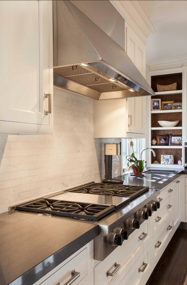 Kitchen Design Ideas. Kitchen Hood, Kitchen Cooktop, Kitchen Backsplash, Kitchen Cabinets. The countertop in this kitchen is Cesarstone. #Kitchen #KitchenIdeas #KitchenDesign Designed by John Johnstone Kitchen & Bath Designers.
