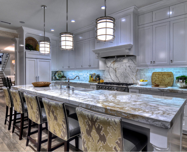 Kitchen. KItchen with marble countertop. The countertop in this kitchen is is a marble slab material called Calacatta Vechia. The backsplash is a 3x6 porcelain subway tile in a greyish finish. #Kitchen #KitchneMarbleCountertop.