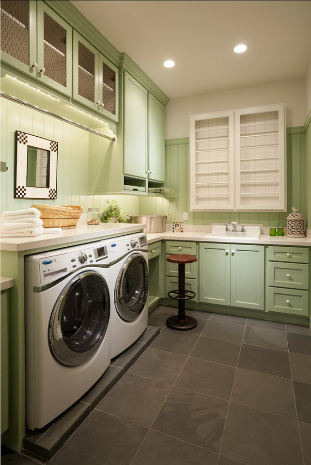 Laundry Room. Laundry Room Ideas. Laundry room with custom cabinets, storage space and drying rack. Laundry Room Design. THINK architecture Inc.
