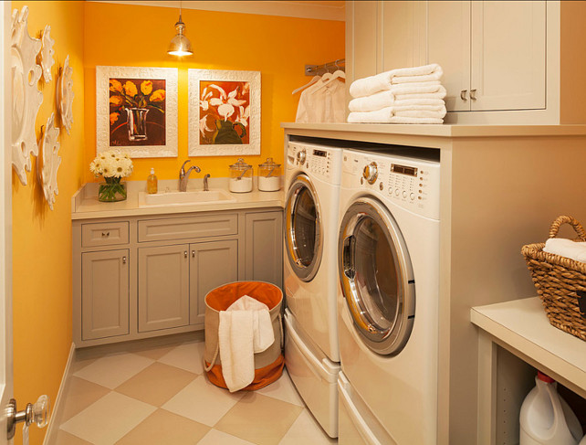 Laundry Room Ideas. The wall paint color is Benjamin Moore Sweet Orange 2017-40. The gray cabinet paint color is Benjamin Moore Smoke Embers 1466 #LaundryRoom #PaintColor #LaundryRoomIdeas