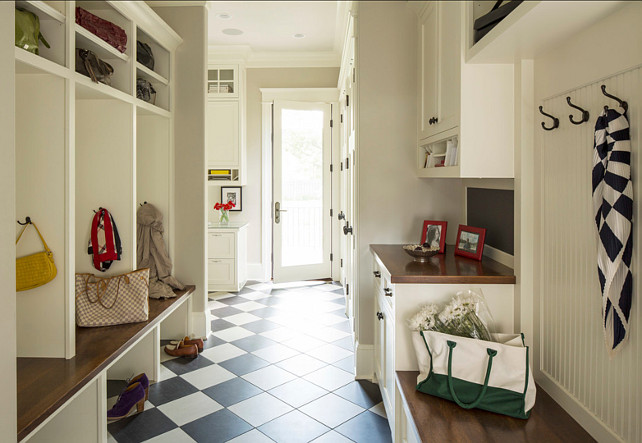 Mudroom Design. Great mudroom design with storage ideas. Paint on walls is Revere Pewter HC-172 by Benjamin Moore. #Mudroom #MudroomStorage #MudroomCubbies #MudroomIdeas