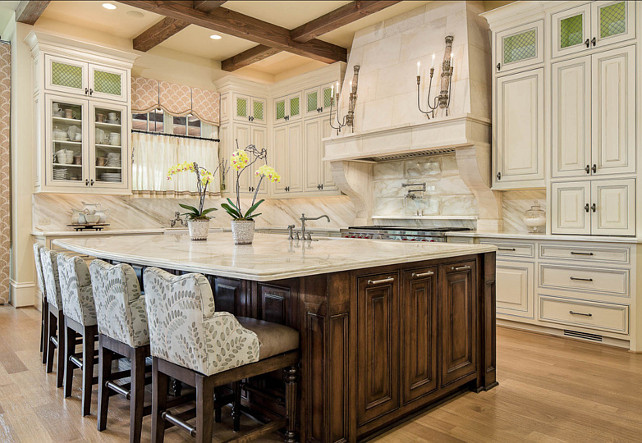 Traditional French Kitchen. French Traditional Kitchen Design. The countertop and backsplash are both marble. French Kitchen