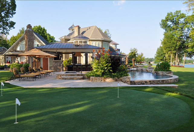 Putting Green. Backyard with putting green and pool. Bruce Clodfelter and Associates.