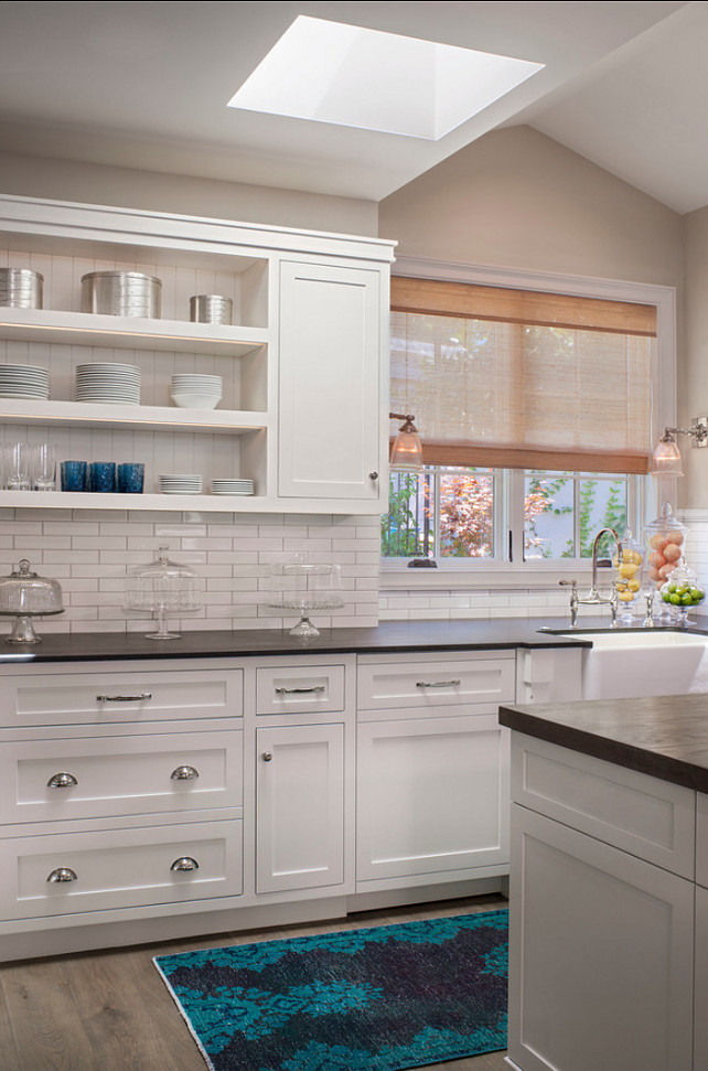 White Kitchen. White Kitchen Ideas. White kitchen cabinets with black honed granite countertop