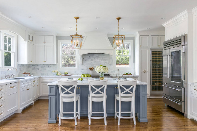 https://www.homebunch.com/wp-content/uploads/2017/05/White-Kitchen-with-stacked-cabinets-and-grey-island.-White-Kitchen-with-stacked-cabinets-and-grey-island-design.-White-Kitchen-with-stacked-cabinets-and-grey-island-WhiteKitchen.jpg