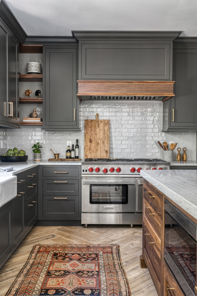 This modern farmhouse-style family home's kitchen features Emtek's