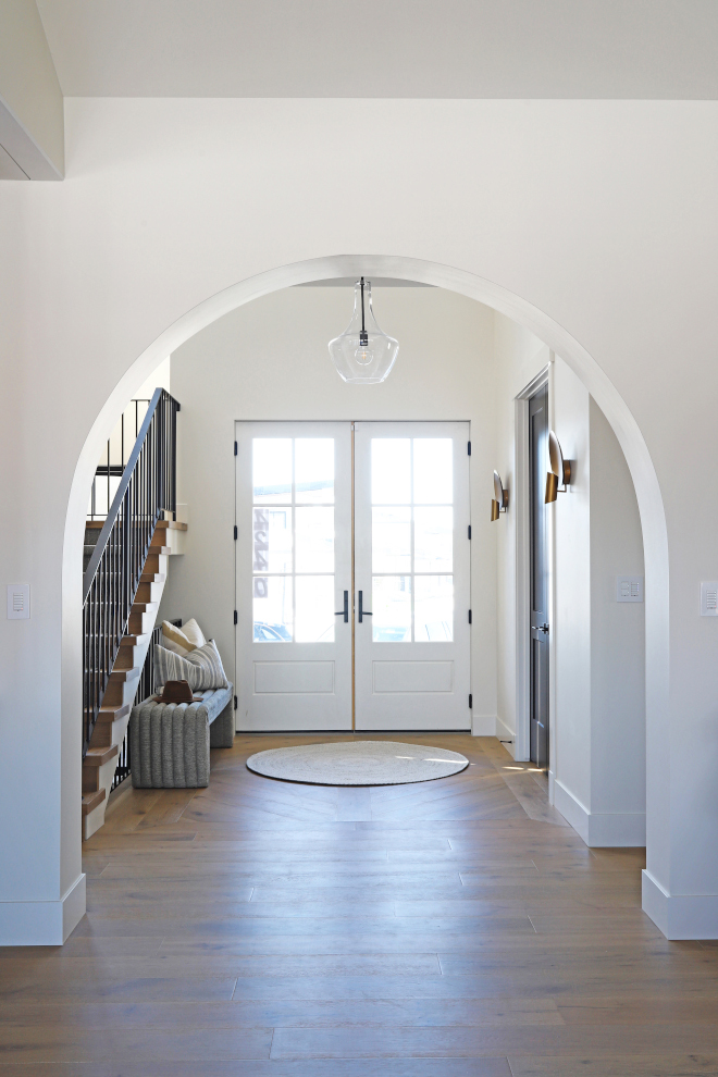 Foyer Archway You are greeted by a breathtaking double-volume entry space as you enter through the grand double doors #Foyer Archway You are greeted by a breathtaking double-volume entry space as you enter through the grand double doors #Foyer #Archway #doubleceiling #entry #doubledoors Foyer-Archway-double-doors