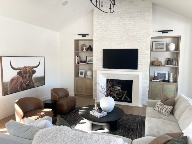 Modernity meets warmth in the great room with over-mortared brick fireplace #Modernity #warmth #greatroom #overmortaredbrick #brickfireplace