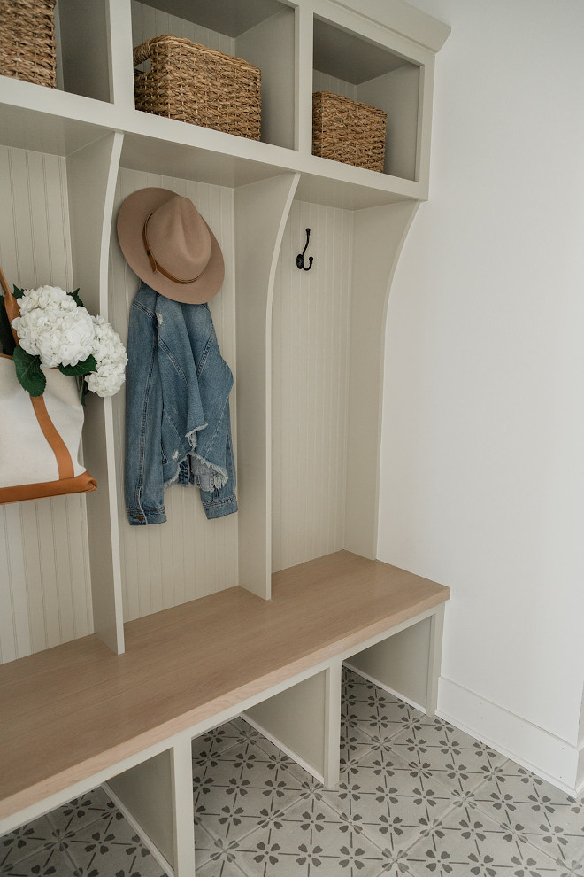 Neutral custom mudroom cubbies feature curved dividers Neutral custom mudroom cubbies feature curved dividers #Neutral #custommudroom #cubbies #curveddividers Neutral-custom-mudroom-cubbies curved-dividers
