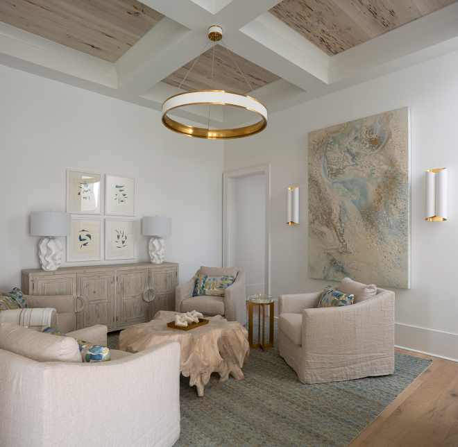Living room Pecky Cypress coffered ceilings and gold accents warm up the space Living room Pecky Cypress coffered ceilings and gold accents warm up the space #Livingroom #PeckyCypress #cofferedceilings #goldaccents #warmspace