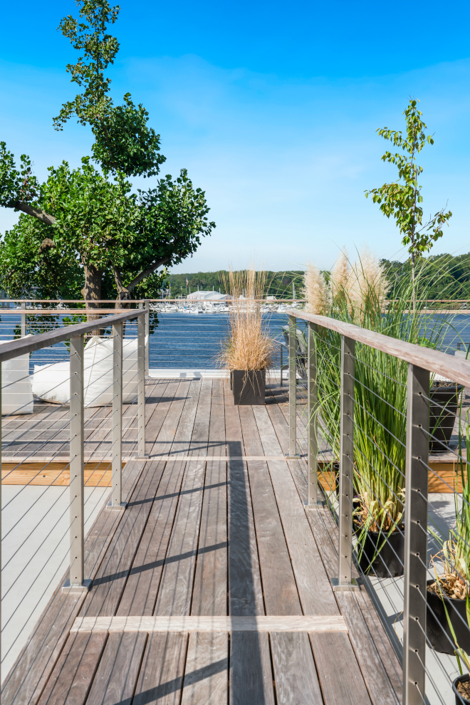 This deck offers the ideal spot to enjoy your morning coffee while listening to the gentle rustle of the nearby waves #deck #view #cablerailing