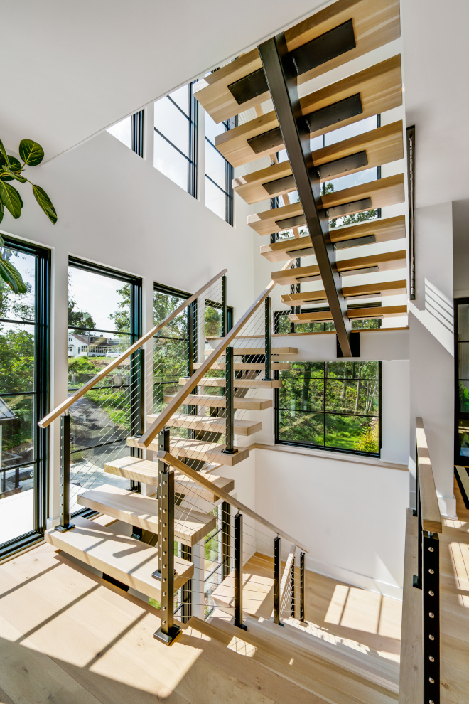 modern white oak floating staircase with metal spine and cable railing modern white oak floating staircase with metal spine and cable railing modern white oak floating staircase with metal spine and cable railing #modern #whiteoak #floatingstaircase #metal #spinestairway #cablerailing