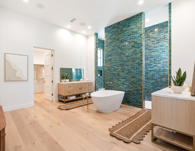 Doorless Shower primary bathroom features a very large doorless shower clad in a teal Zellige tile Doorless Shower primary bathroom features a very large doorless shower clad in a teal Zellige tile #DoorlessShower #bathroom #Zelligetile