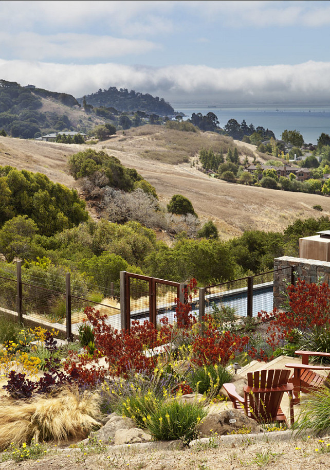 The meandering path and sitting area nestle in a warm pallet of colors maximizing the use of the side property and views of the San Francisco Bay. #Gardening #Landscpaing