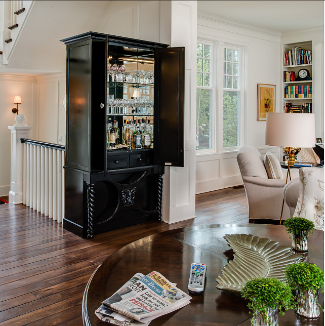 Bar Ideas. Custom cabinet hides a convinient and elegant bar. #Bar #Cabinet #BarIdeas #HiddenBar