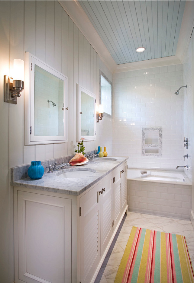 Bathroom. Bathroom Ideas. Coastal bathroom with painted blue ceiling and beadboard walls. Bathroom.