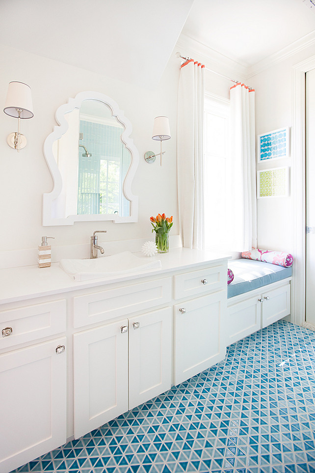 Bathroom. Kids Bathroom Ideas. Kids Bathroom with playful design. The mirror is from Jonathan Adler. #Bathroom #KidsBathroomDesign #BathroomDecor Tracy Hardenburg Designs.