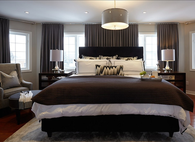 Bedroom. Bedroom Ideas. Stylish Gray Bedroom with Tailored Furniture and Draperies. #Bedroom #GrayBedroom #GreigeBedroom #BedroomIdeas Designed by Nest Design Studio.