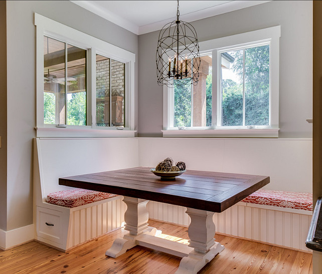 Eating Nook. Breakfast Nook. This eating nook is perfect for family living. The wall color is Benjamin Moore LaPaloma 1551. The light fixture is Circus Wire Cage Lantern. #EatingNook #Nook #BreakfastNook