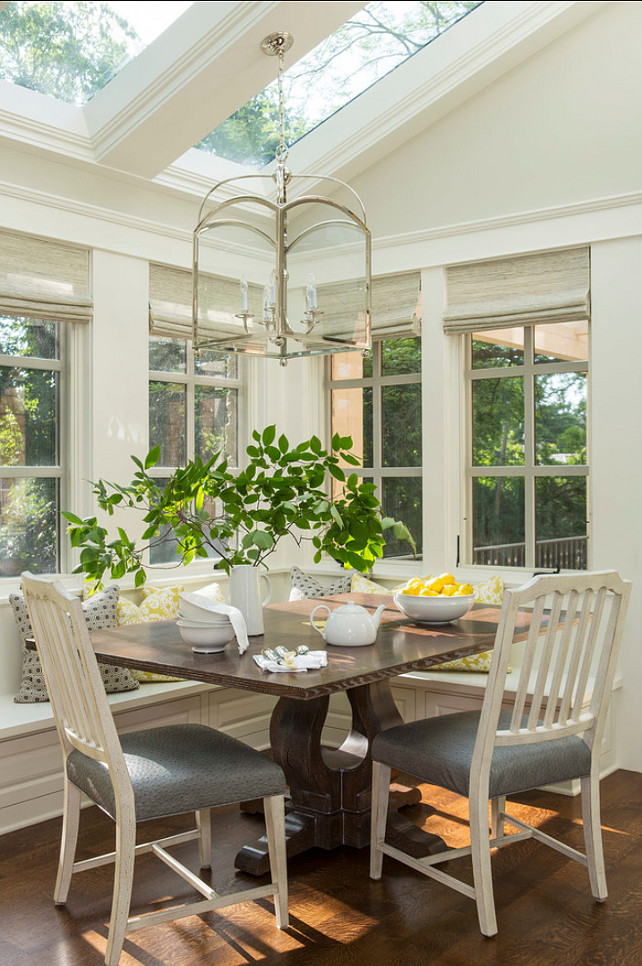 Eating Nook. This eating nook is perfect for family living. Paint Color on walls is Benjamin Moore Revere Pewter HC172 and Trim Paint Color is Benjamin Moore White Dove OC017. Light Fixture is the E.F. Chapman medium arch top lantern. #EatingNook #Nook #BMReverePewter