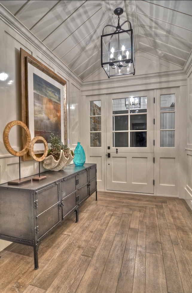 Entry. Foyer. This monochromatic entry invites guests into this casual coastal home that combines a casual feel with just a touch of formality. #Entry #Foyer