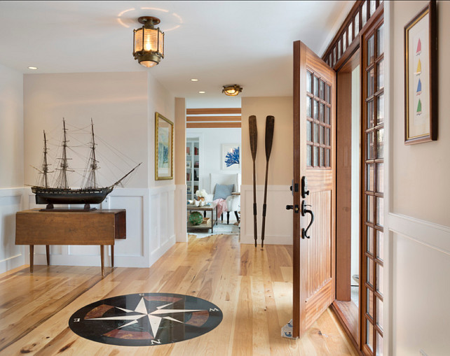 Entryway. Coastal Entryway Ideas. This is a very original coastal entryway with an antique ship model and .savage ship lights. Sailboat print is actually original art. #Entryway #EnrywayIdeas #CoastalInteriors #Coastal 