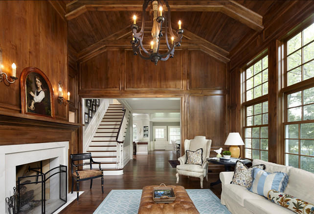 Family Room. Wood Paneling Living Room. Traditional Living Room. The wood paneling on walls are made of alder and the stain was a custom mix. #LivingRoom #TraditionalLivingRoom #TraditionalInteriros #WoodPanelingIdeas Designed by Yunker Associates Architecture.