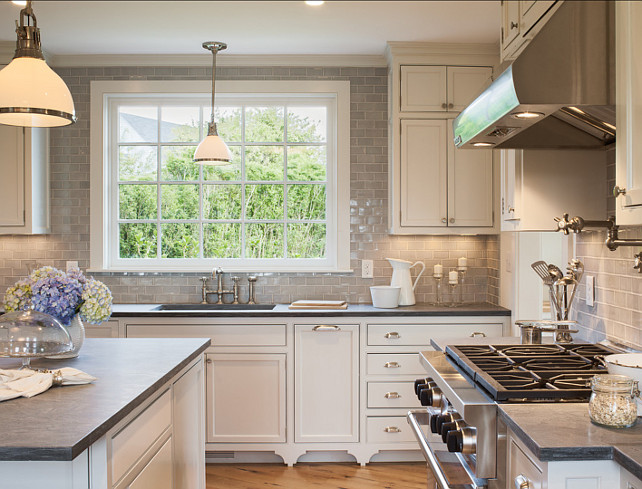 Kitchen Design Ideas. Kitchen countertops are honed Pietra del Cardoza. The tile is a custom color (seafoam-ish) 2"x4" subway porcelain with a hand-applied glaze by "Mexican Handcrafted Tile Inc". #KitchenDesignIdeas #KitchenIdeas #KitchenCountertop