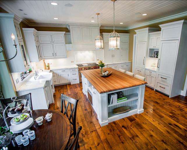 Kitchen Design Ideas. Spacious white kitchen design ideas. Hardwood floors are antique heart pine with a dark stain. #Kitchen #KitchenIdeas #SpaciousKitchen #Whitekitchen