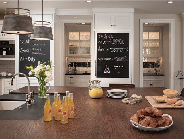 Kitchen Ideas. There are great ideas in this kitchen. Countertop is butcher's block on the island. Note the chalkboard paint on the cabinets. #Kitchen #KitchenIdeas