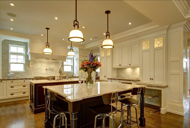 Kitchen. Transitional White Kitchen with two islands. Kitchen Cabinet Paint Color: "Benjamin Moore White Heron OC-57". #Kitchen #TransitionalKitchen #WhiteKitchen