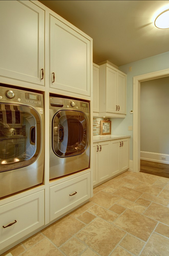 Laundry Room. This laundry room features built-in cabinets that brings the washer and dryer to a higher position, which means less back pain! #LaundryRoom #LaundryRoomCabinet