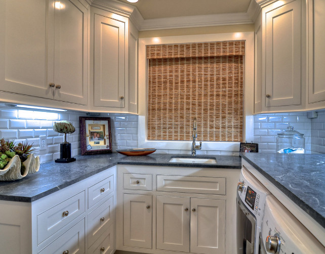 Laundry Room. Laundry Room Design. Built in cabinets and marble counter tops make this laundry room organized as well as beautiful. Countertop is soapstone. #LaundryRoom #LaudnryRoomDesign #LaundryRoomIdeas #LaundryRoomCabinets