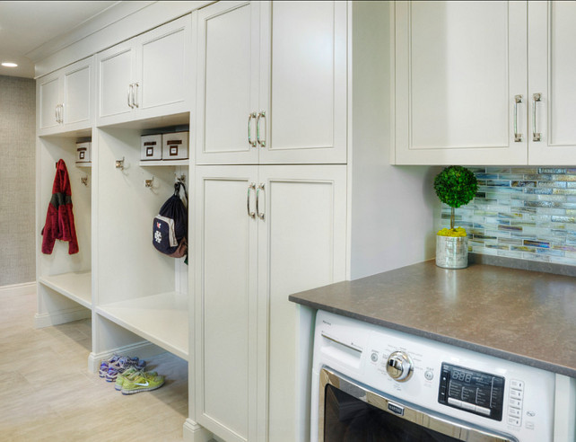 Laundry Room. Laundry Room cabinet Paint Color is Benjamin Moore Navajo White. #LaundryRoom