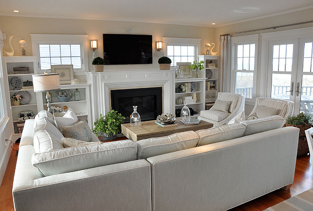 Living Room Ideas. Living room with built-in and great furniture layout. Family Room. Family room design with built-in surrounding fireplace. #FamilyRoom #FamilyRoomBuiltin #LivingRoom #FurnitureLayout #Interiors