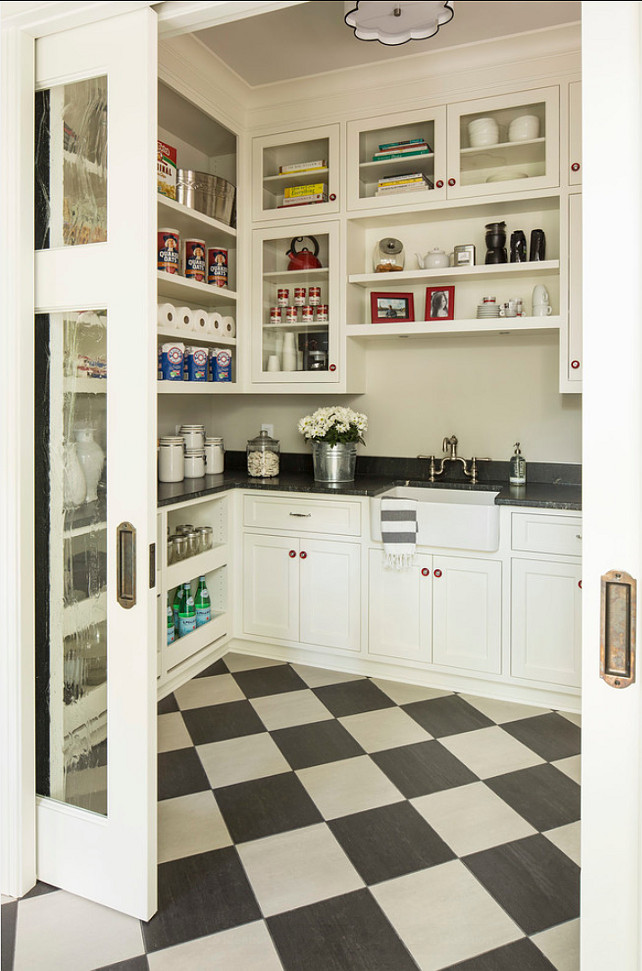 Pantry Ideas. Great pantry design ideas. Kitchen pantry with lots of storage. Floors are "Casalgrande Padana, and the name is Granitogres - Marta". The colors: "Nero Acapulco" (darker) and "Grigio Egeo" (lighter). Light fixture is the "Robert Abbey Axis Aged Brass Ceiling Light" #Pantry #KitchenPantry #PantryIdeas