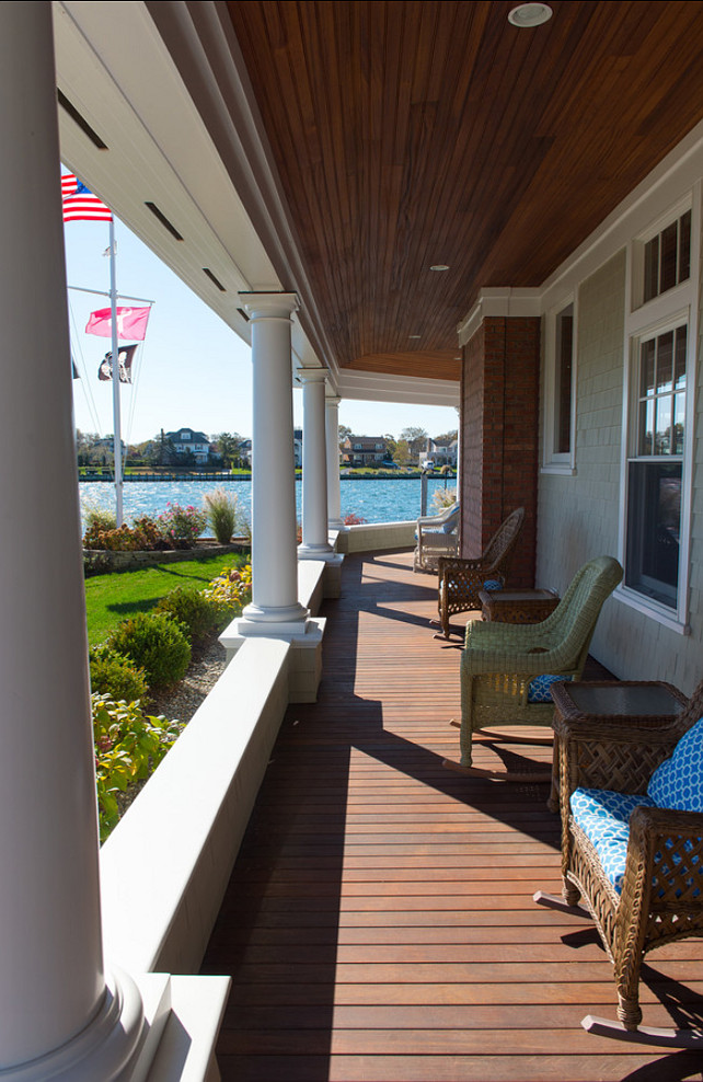 Porch. Porch Design Ideas. Porch with ocean view and wicker rocking chairs. #Porch #FrontPorch #PorchFurniture CMM Construction Inc.