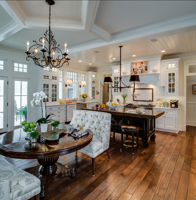 Traditional Kitchen Design. Beautiful traditional kitchen with breakfast room. The Settee is from Kravet Furniture. #Kitchen #TraditionalKitchen #KitchenDesign