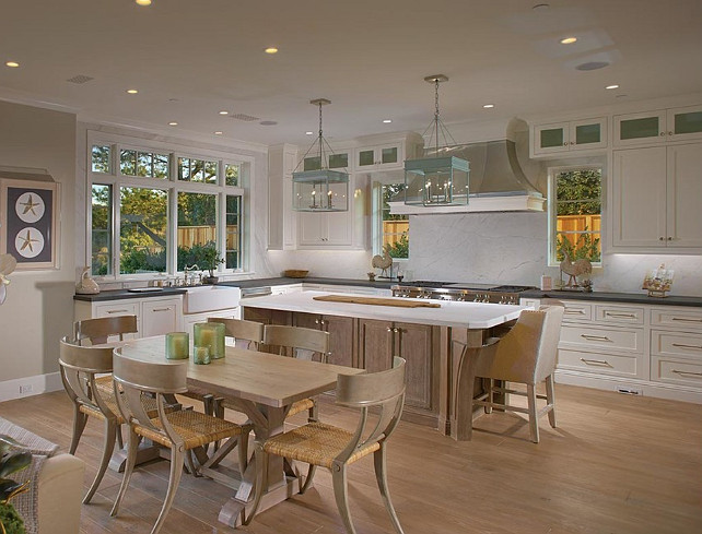 White Kitchen. Gorgeous white kitchen with Urban Electric Co. Michael Amato Chisholm Hall Pendants, white kitchen cabinets with marble countertops. #WhiteKitchen #Kitchen #KitchenIdeas #KitchenDesign #KitchenLayout