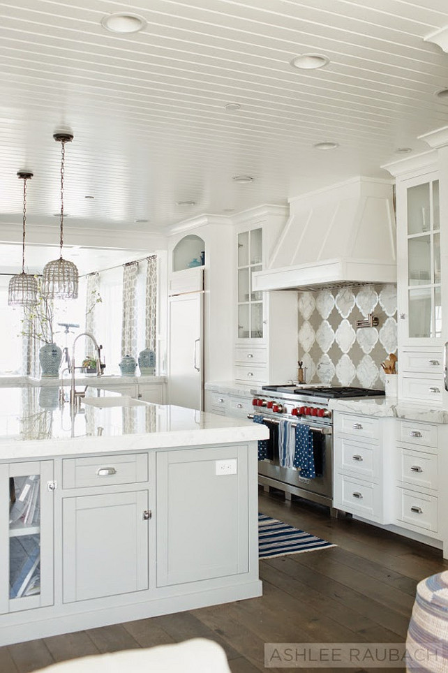 White Kitchen. White Kitchen with island, dark hardwood floors and beadboard ceiling. #WhiteKitchen